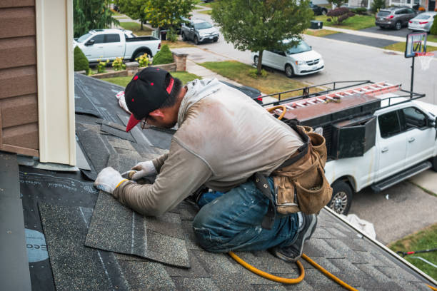Professional Roof Replacement technician working in Cambria, WI